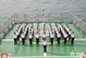 Coast Guard Ship 8002 hold flag-raising ceremony at sea